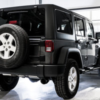 AWE Tuning 07-18 Jeep Wrangler JK/JKU 3.6L Tread Edition Axle-Back Dual Exhaust - Diamond Black Tips